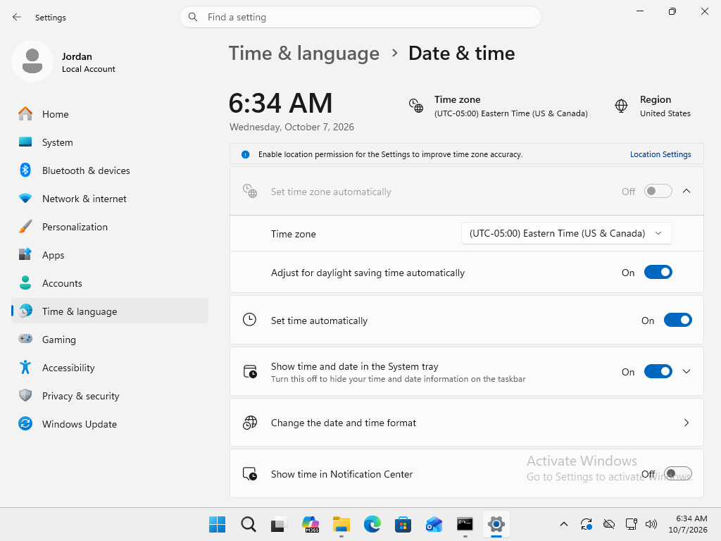 Windows 11 Date and time settings showing Eastern Time, automatic daylight saving enabled and automatic clock time enabled.